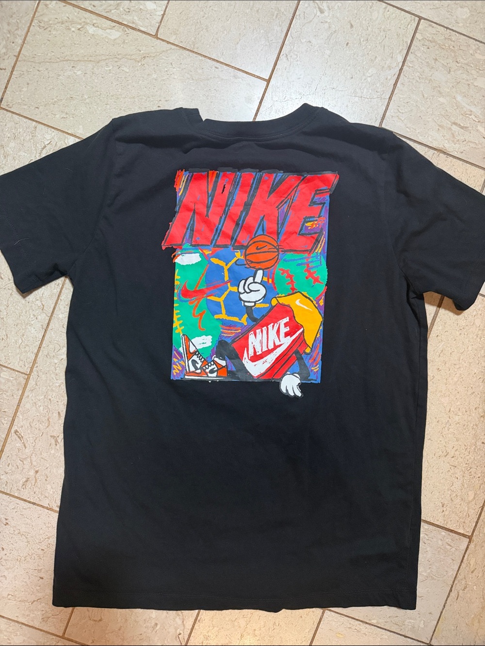 Used once. Nike Black Tee with Colorful Basketball Graphic